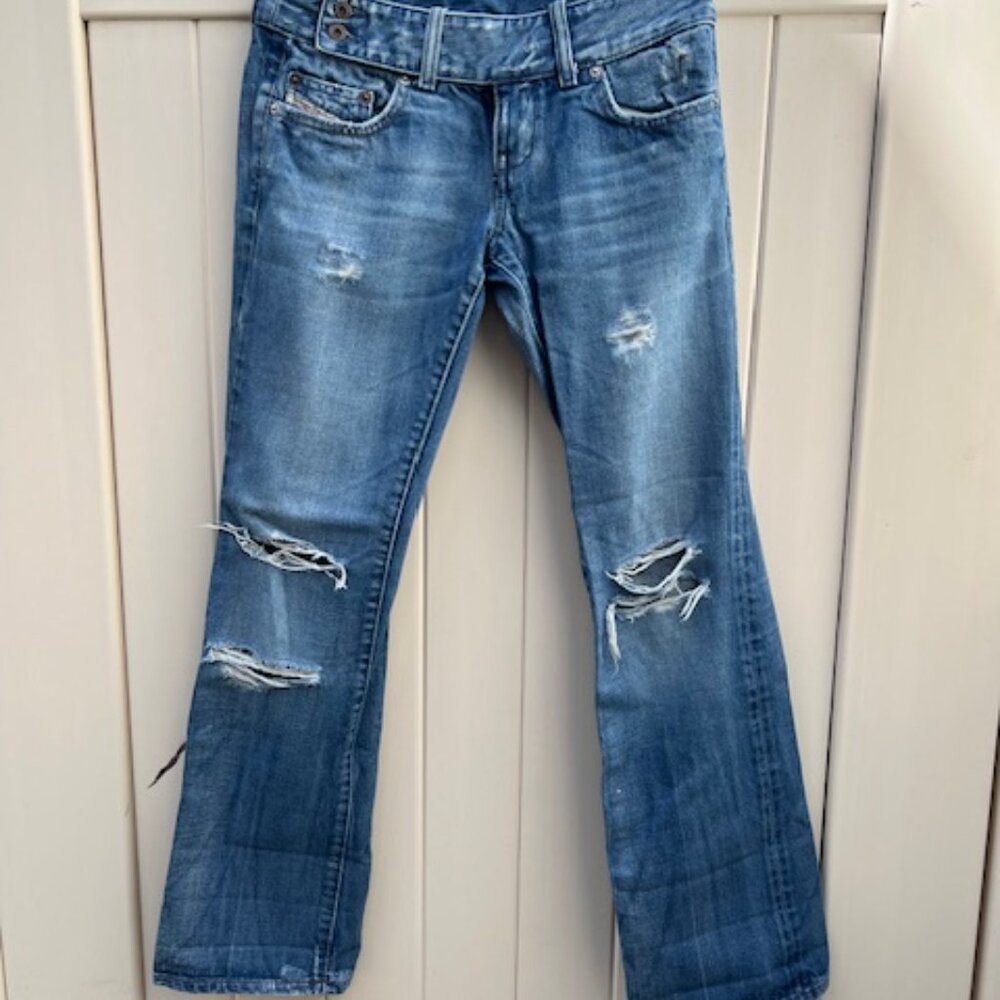 DIESEL Womans bootcut Jean Color: Blue Size: 28